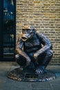 Bronze monkey statue in London. England, UK.