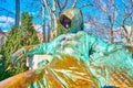 The bronze monument to Anonymous with his work, Vajdahunyad Castle in Budapest, Hungary