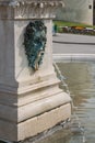 Bronze mythical creature fountain side shot close up