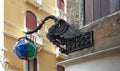 bronze ornate street lamp in the shape of a dragon, Venice, Italy Royalty Free Stock Photo