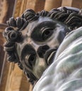 Bronze Perseus Statue Close Up Face Gazes Down at Camera