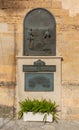 Bronze plaque commemorating Friar Juniper Serra