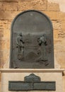 Bronze plaque commemorating Friar Juniper Serra