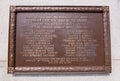 A bronze plaque on the front of Allegheny School honoring the students from the school who died in World War 1