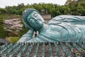 bronze reclining Buddha with cherry blossom, Sasaguri, Fukuoka