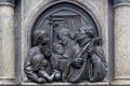 Bronze Relief of Luther playing guitar and singing with his family - wife and children. Lutherdenkmal statue in Eisleben, his