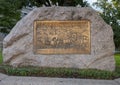 Bronze relief panel mounted to a boulder of Texas pink granite at the site of Camp Worth, the precursor to the City of Forth Worth