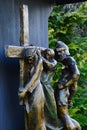 Bronze religious sculptural group from Calvary, fifth Station Of The Cross - Simon of Cyrene helps Jesus carry the Cross