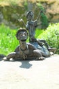 Bronze sculpture of Buratino Pinocchio with the golden key and turtle Tortilla, in the Buki landsc Royalty Free Stock Photo