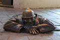 Bronze sculpture called man at work in Bratislava, Slovakia Royalty Free Stock Photo