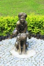 Bronze sculpture of children playing leapfrog in summer park Royalty Free Stock Photo