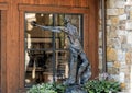 Bronze sculpture of a cowboy outside an art store in Vail, Colorado.