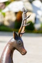 bronze sculpture Fairytale character Silver Hoof in the P.P. Bazhova on a summer day