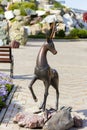 Bronze sculpture Fairytale character Silver Hoof in the P.P. Bazhova on a summer day