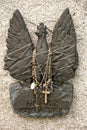 Bronze sculpture on a headstone of a fallen soldier