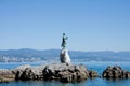 Bronze sculpture of Maiden with Seagull, Opatija Royalty Free Stock Photo