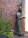 Bronze sculpture of a maidservant `Secret rendezvous`.