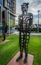 Bronze sculpture of male indigenous aboriginal figure at King Square, Perth, Western Australia