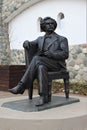 Bronze sculpture of Mark Twain in the Etnomir tourist complex. Royalty Free Stock Photo