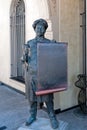 Bronze sculpture of a standing chef with a menu in Tbilisi in Georgia