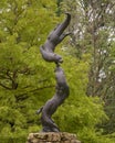 Bronze sculpture titled Arkansas River Otters by Robert Ball in Tulsa, Oklahoma.