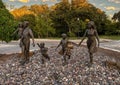 Bronze sculpture titled `Families Are Forever` by Randolph Rose in a roundabout in Colleyville, Texas. Royalty Free Stock Photo