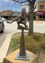 Bronze sculpture titled \'Paper Airplane\' by Gary Lee Price in downtown Edmond, Oklahoma.