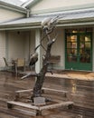 Bronze sculpture titled \'Wood Storks\' by William Turner at the visitor center of the Corkscrew Swamp Sanctuary.