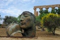 Bronze sculpture in valley in front of temple in Agrigento, Sicily