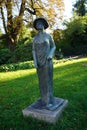 The bronze sculpture `Vietnamese mother with child` stands at the entrance to the castle island `Schlossinsel` of KÃÂ¶penick.