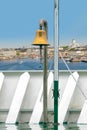 Bronze ship bell on ferry bow Royalty Free Stock Photo