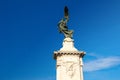 Rome, Italy - September 13, 2017: A bronze statue of an angel holding a wreath. Sculpture on the bridge of Vittorio Emmanuel II.