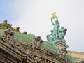 Bronze statue of Apolo on top of the opera of Paris, France, side view