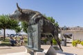 Bronze statue of a bull leaping a fence in Saintes-Maries-de-la-Mer