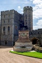 A bronze statue of Charles II on horseback next to the South Wing entrance in Windsor Castle