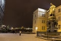 Bronze statue of the eleventh Czech King and Roman Emperor Charles IV. in night snowy Prague with Prague Castle near Charles Bridg Royalty Free Stock Photo