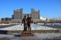 A bronze statue featuring a young couple in Astana