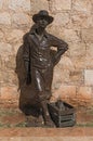 Bronze statue fisherman on the city wall of San Francisco de Campeche, Mexico