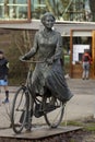Bronze statue of former queen now princess Beatrix on a bike