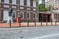 Bronze Statue of George Washington in front of Independence Hall and cobblestone road