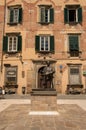 Bronze statue of Giacomo Puccini in a square of his birth town