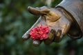 Bronze Statue Hand Holding Flowers