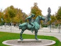 Bronze statue of horse rider looking forward Royalty Free Stock Photo