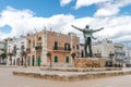 Bronze statue of the Italian singer Domenico Modugno in Polignano a Mare, Bari, Italy