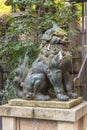 Bronze statue of a lion komainu mythological guardian in Japan