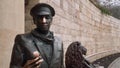 Bronze statue of literal russian hero ostap bender near entrance to Proval cave