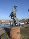 Bronze statue of man and albatross