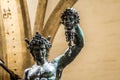 Bronze statue of Perseus holding the head of Medusa in Florence, made by Benvenuto Cellini in 1545