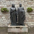 Bronze statue of Petro and Giovanna Bernardone, the parents of Saint Francis of Assisi.