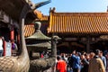 Bronze statue of phoenix in front of Yukun Palace, one of the Six Western Palaces, in the Forbidden City.the main buildings of the